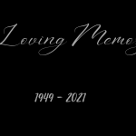 A decorative image with a black background with the words "In Loving Memory, 1949 to 2021" in gray script for a post about the death of a parent, and to commemorate my mom who died today.