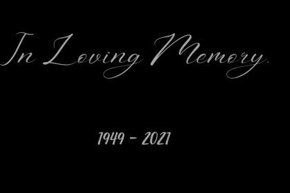 A decorative image with a black background with the words "In Loving Memory, 1949 to 2021" in gray script for a post about the death of a parent, and to commemorate my mom who died today.