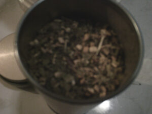 A close-up of the contents of some looseleaf tea, in White Ginger Pear from Teabloom.